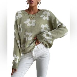 Medium green and white flowered sweater.